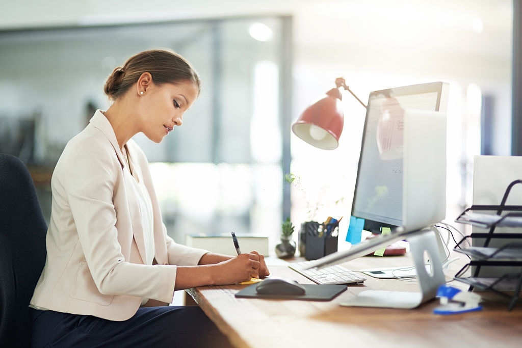Cropped shot of a young businesswoman at work